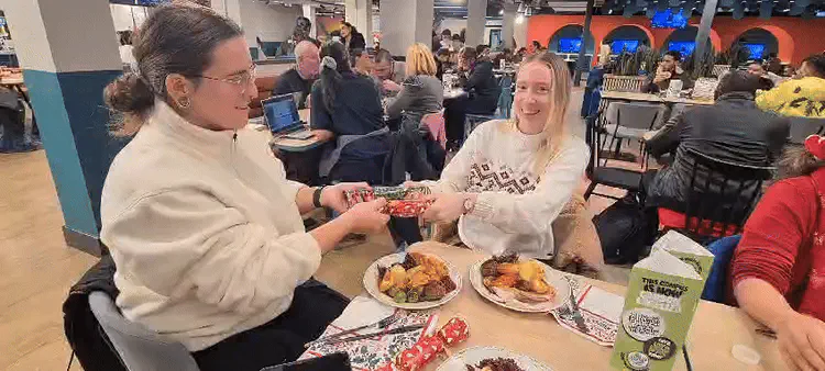 2024 - Pulling the Christmas crackers (Ana and Emma)